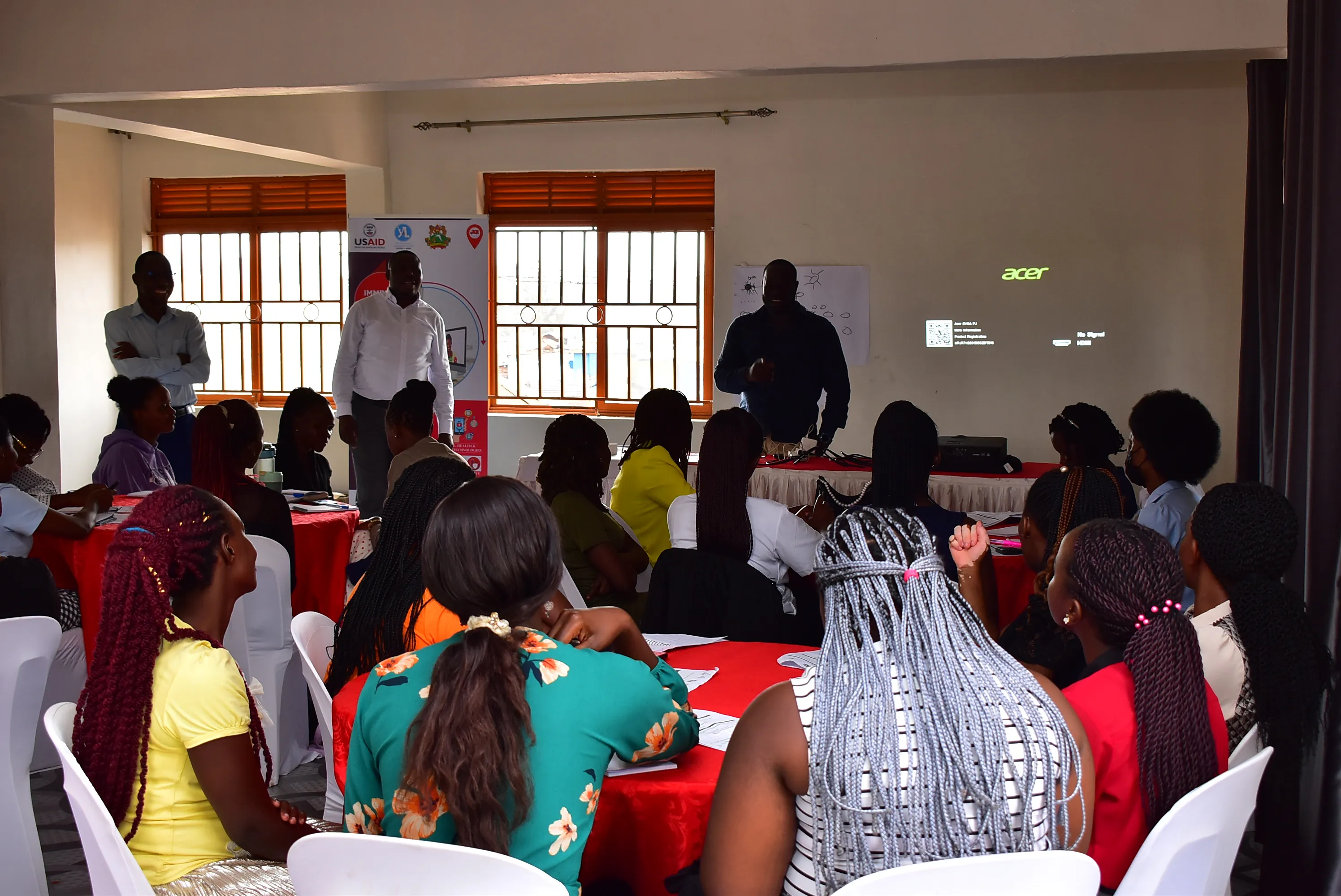 Young women learning telehealth tools